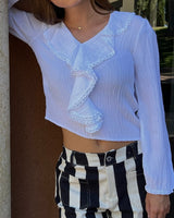 BLUSA VOLANTES BRILLO BLANCO