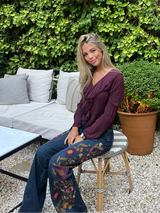 BLUSA VOLANTES BRILLO GRANATE