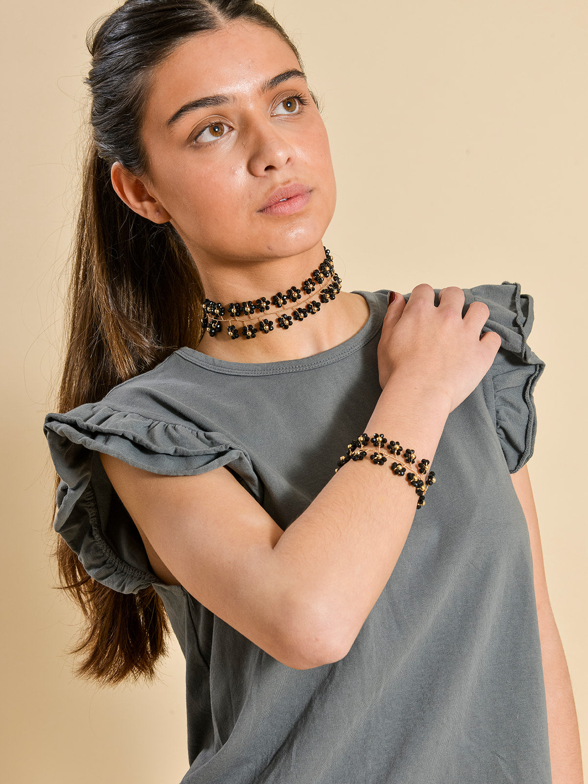 PULSERA MARGARITAS NEGRAS